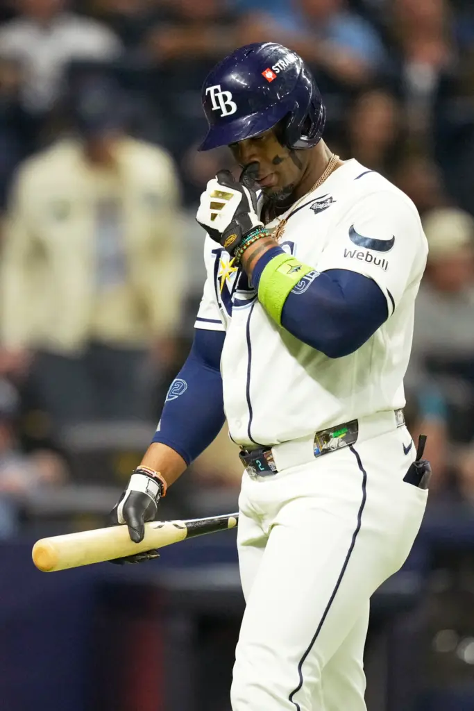 The Tampa Bay Rays’ Yandy DÃ­az reacts after striking out...