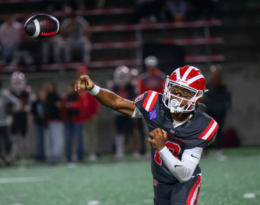 Mater Dei quarterback Paytyn Guess throws a pass as he...