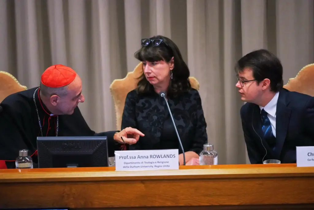 FILE – From left, Cardinal Víctor Manuel Fernández, prefect of...