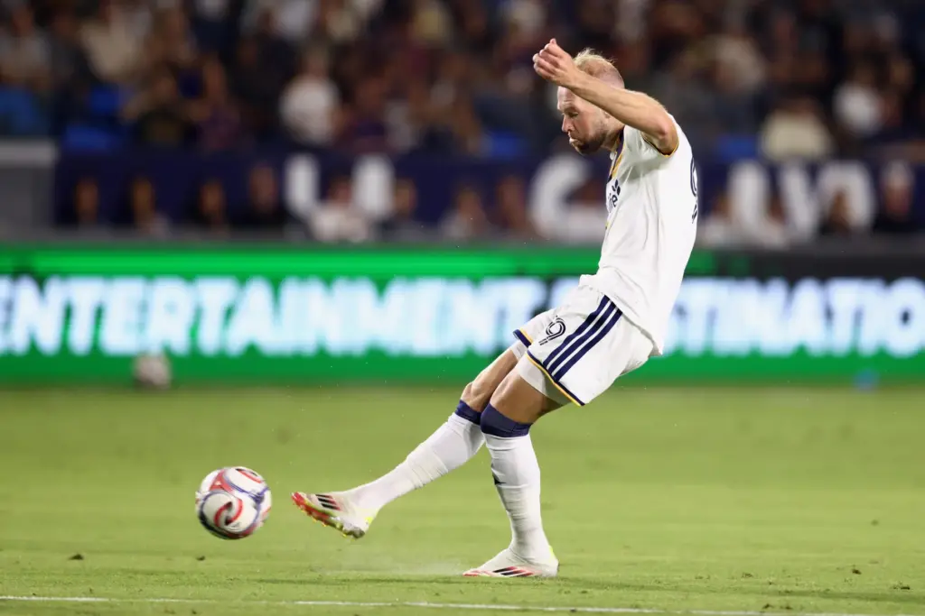 Los Angeles Galaxy forward JoÃ£o Klauss kicks the ball for...
