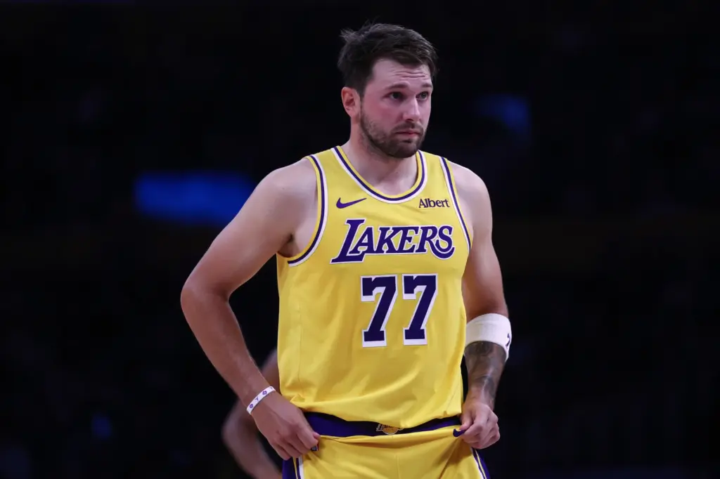 Lakers guard Luka Doncic looks on during the first half...