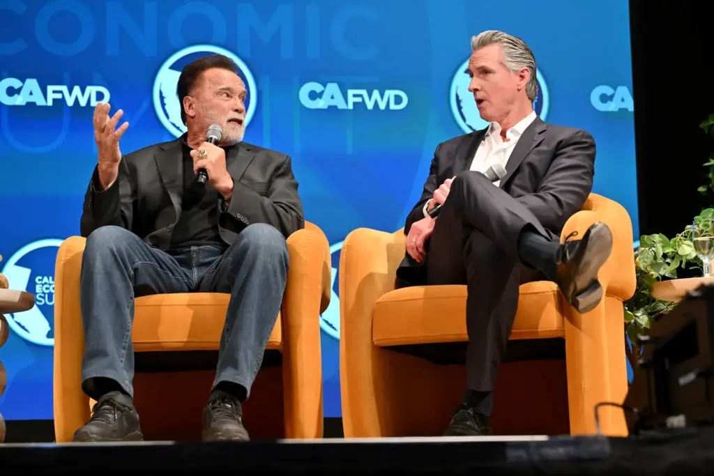 Governor Gavin Newsom participates in a fireside chat with former...