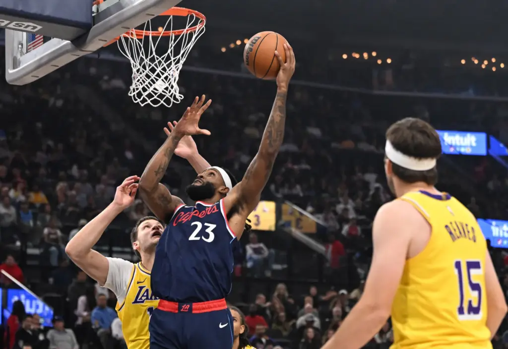 Clippers forward/center Isaiah Jackson drives to the basket as Lakers...