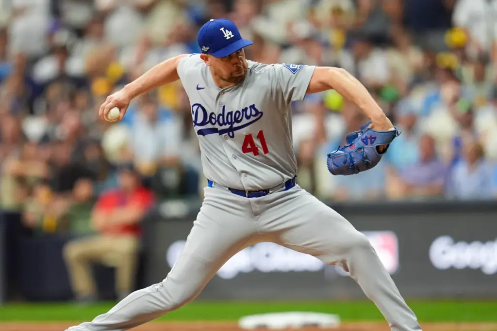 Dodgers relief pitcher Brock Stewart throws to the plate during...