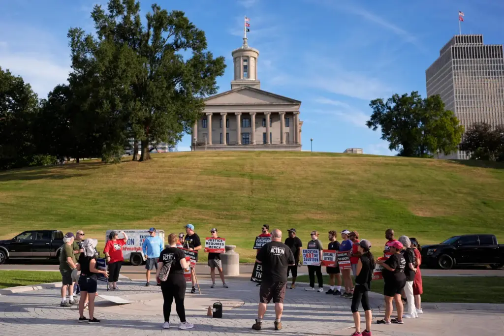 People gather during a March 4 Mercy protest against the...