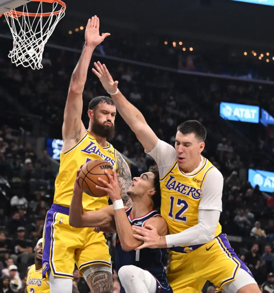 Clippers rookie guard Keaton Wagler drives to the basket between...