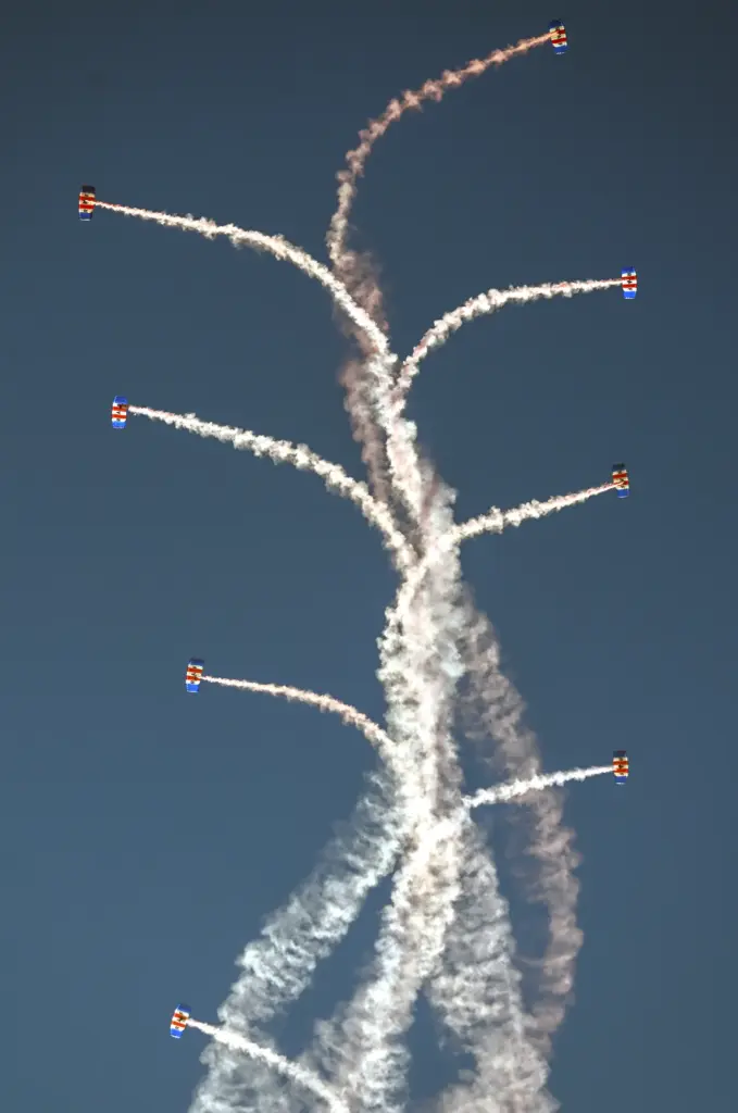 The Royal Air Force Falcons parachute team jump over the...