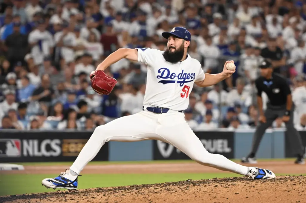 Dodgers relief pitcher Alex Vesia throws to the plate during...