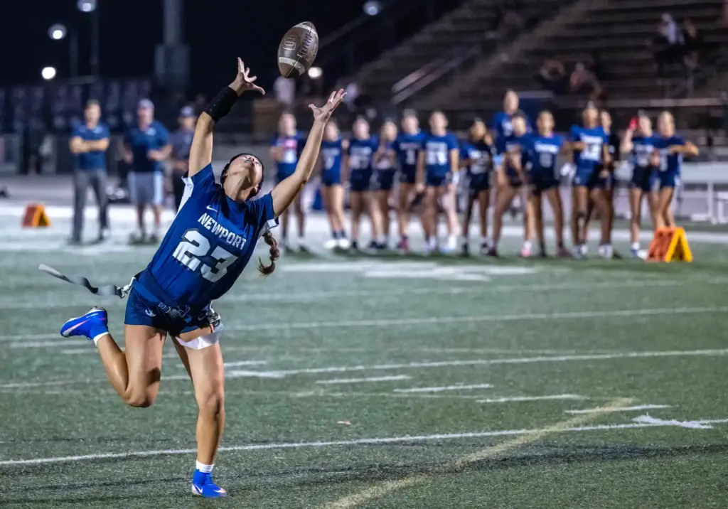 Newport Harborâs Chloe Enciso (23) nearly makes a sprinting catch...