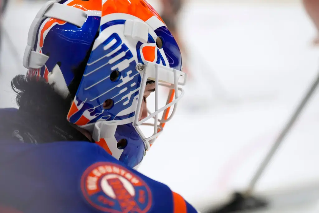 Edmonton Oilers goaltender Devon Levi takes a break during a...