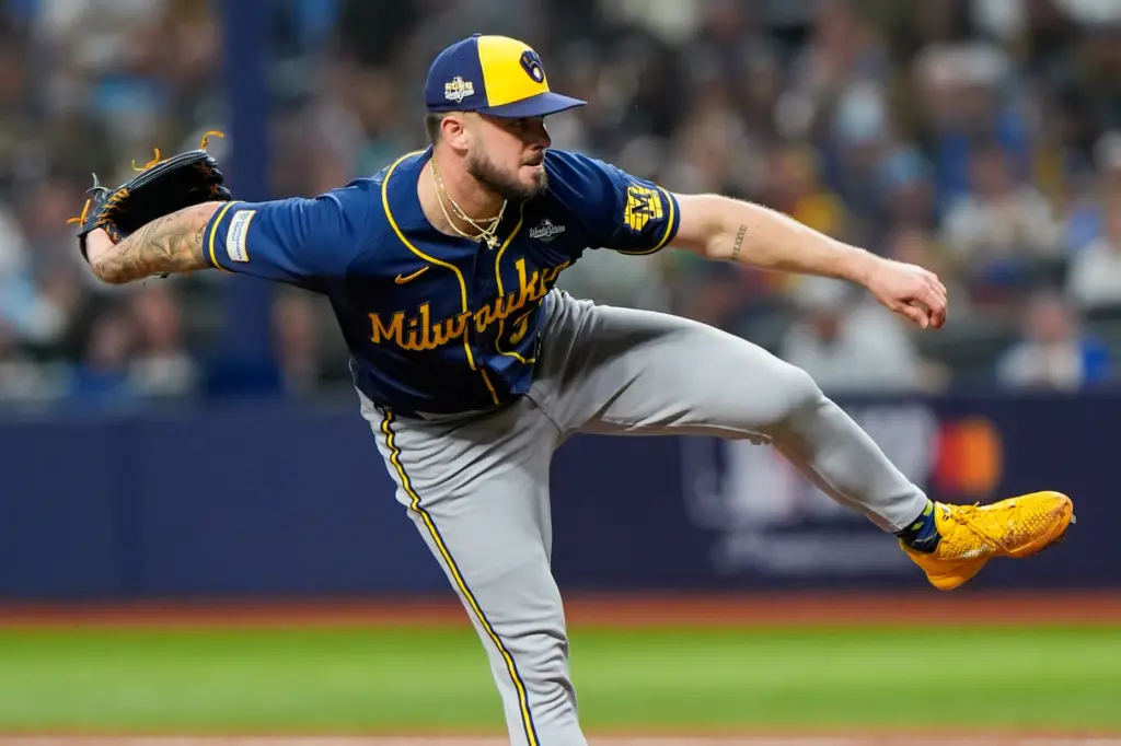 Milwaukee Brewers relief pitcher DL Hall throws to the plate...