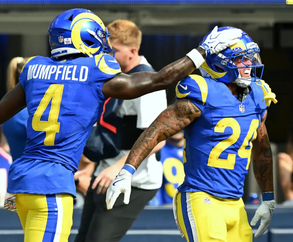 Rams running back Blake Corum (24) celebrates his touch down...