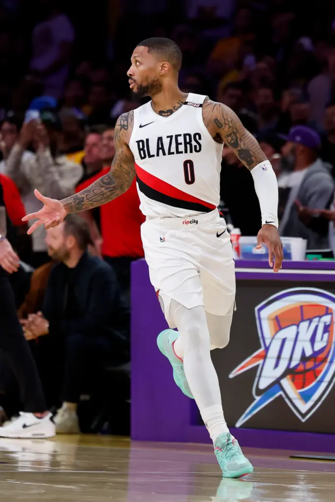 Portland Trail Blazers guard Damian Lillard celebrates after making a...