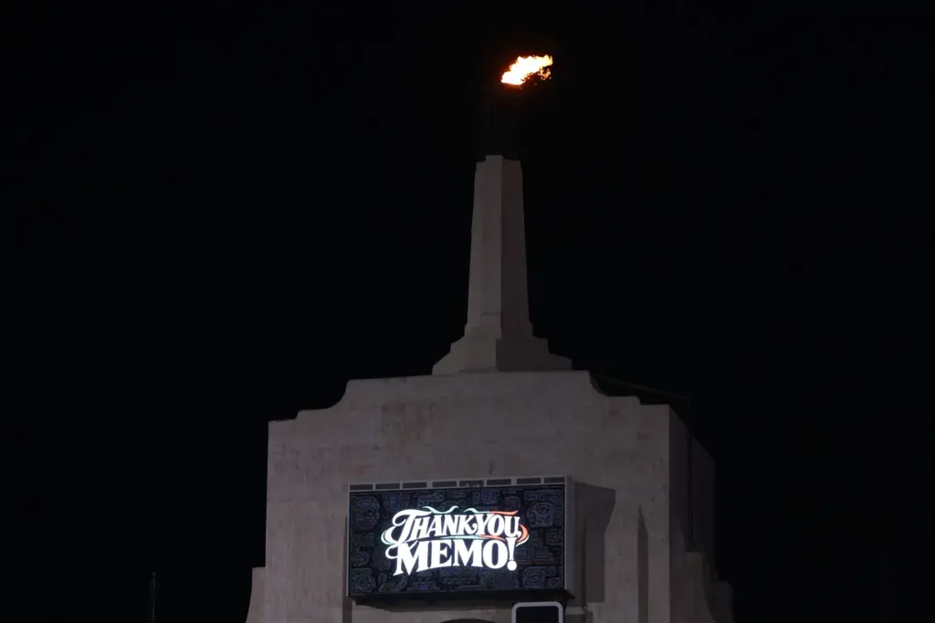 The stadium torch is lit in honor of former Mexico...