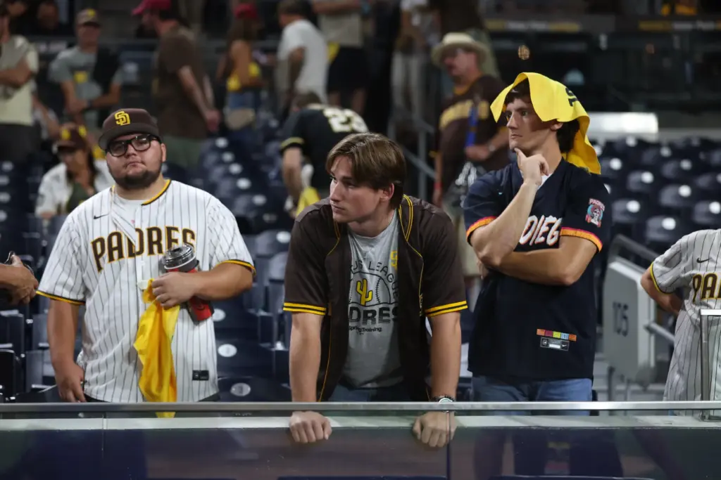 Fans reacts to the Milwaukee Brewers’ 3-1 victory over the...