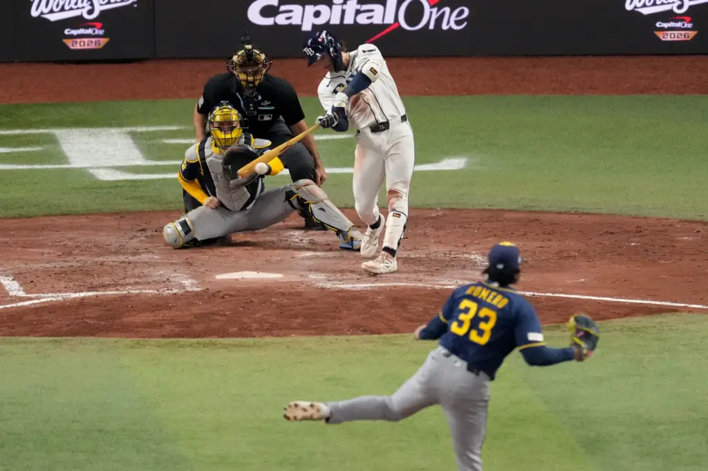 The Tampa Bay Rays’ Jonny DeLuca hits into an RBI...