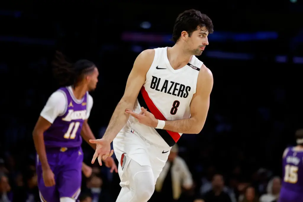 Portland Trail Blazers forward Deni Avdija gestures after making a...