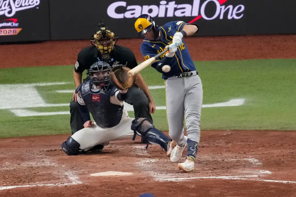 The Milwaukee Brewers’ Cooper Pratt connects for an RBI double...