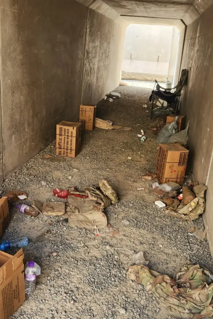 In this photo obtained by The Associated Press, discarded military...