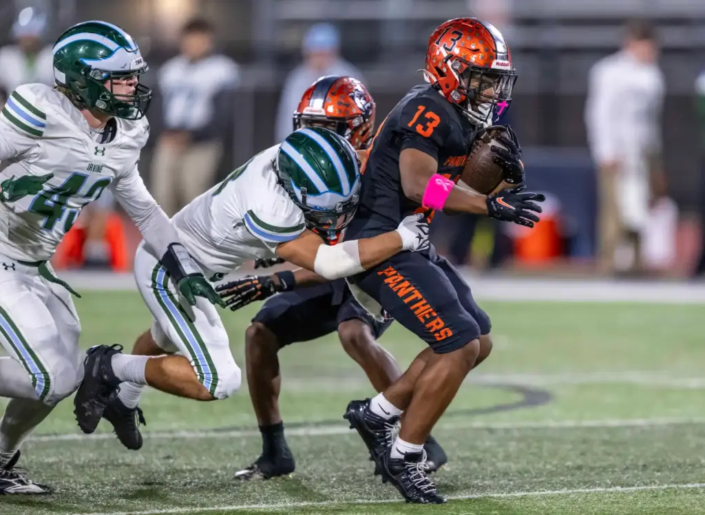 Orange running back Jeremiah Dunklin (13) carries the ball during...
