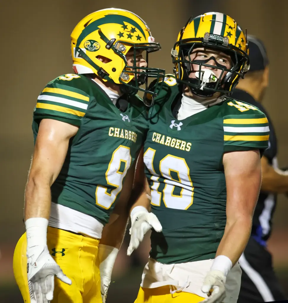 Edisonâs Samuel Edmisten, left, and teammate Logan Hampton, right, celebrate...