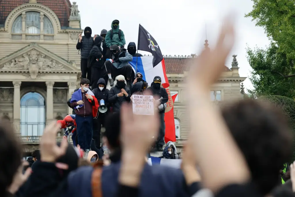 Protesters attend a demonstration against rising living costs in Strasbourg,...