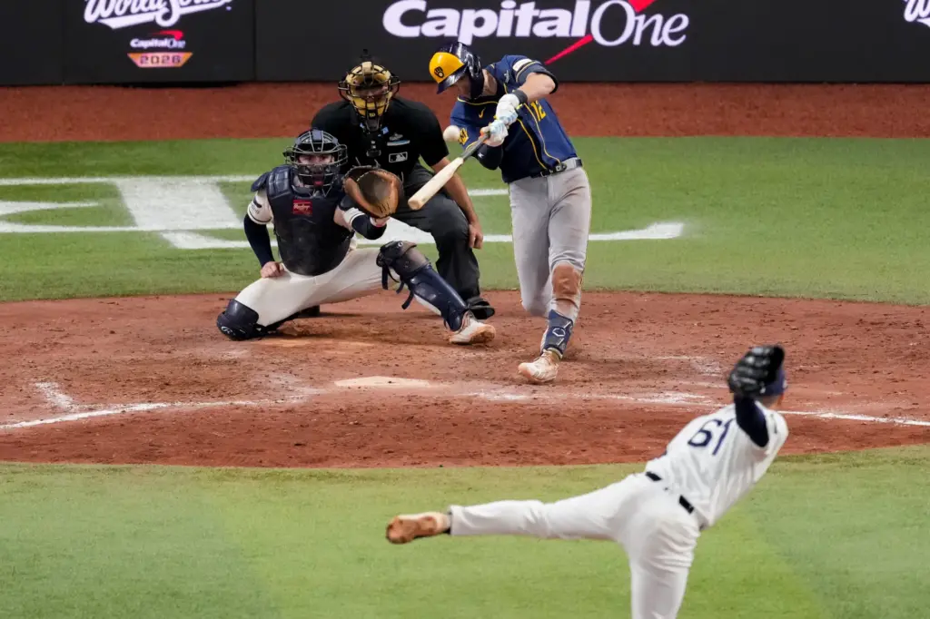 The Milwaukee Brewers’ Cooper Pratt connects for a tiebreaking solo...