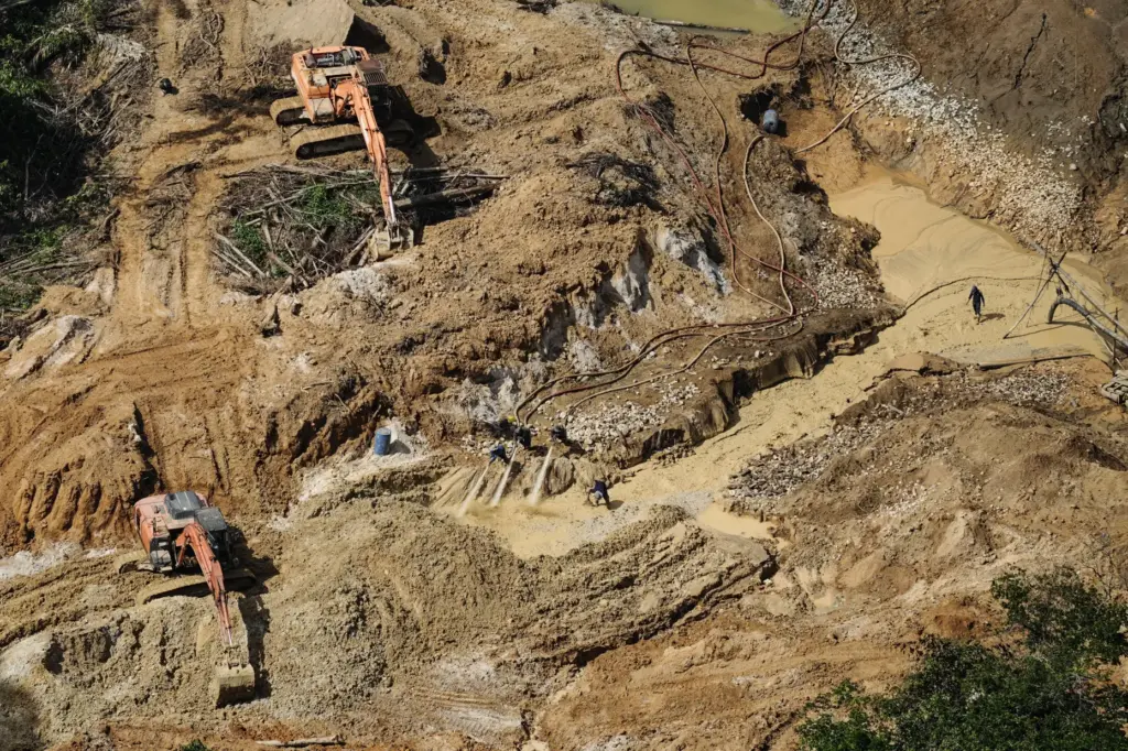 Illegal mining is visible in the Saamaka territory of the...