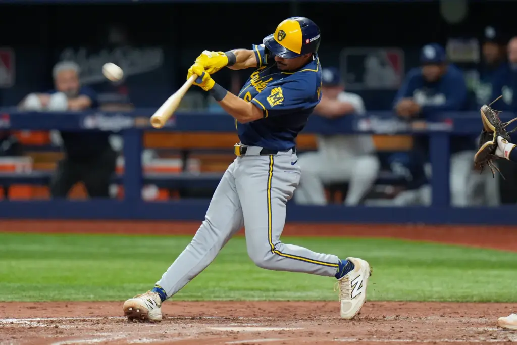 The Milwaukee Brewers’ David Hamilton connects for a solo home...