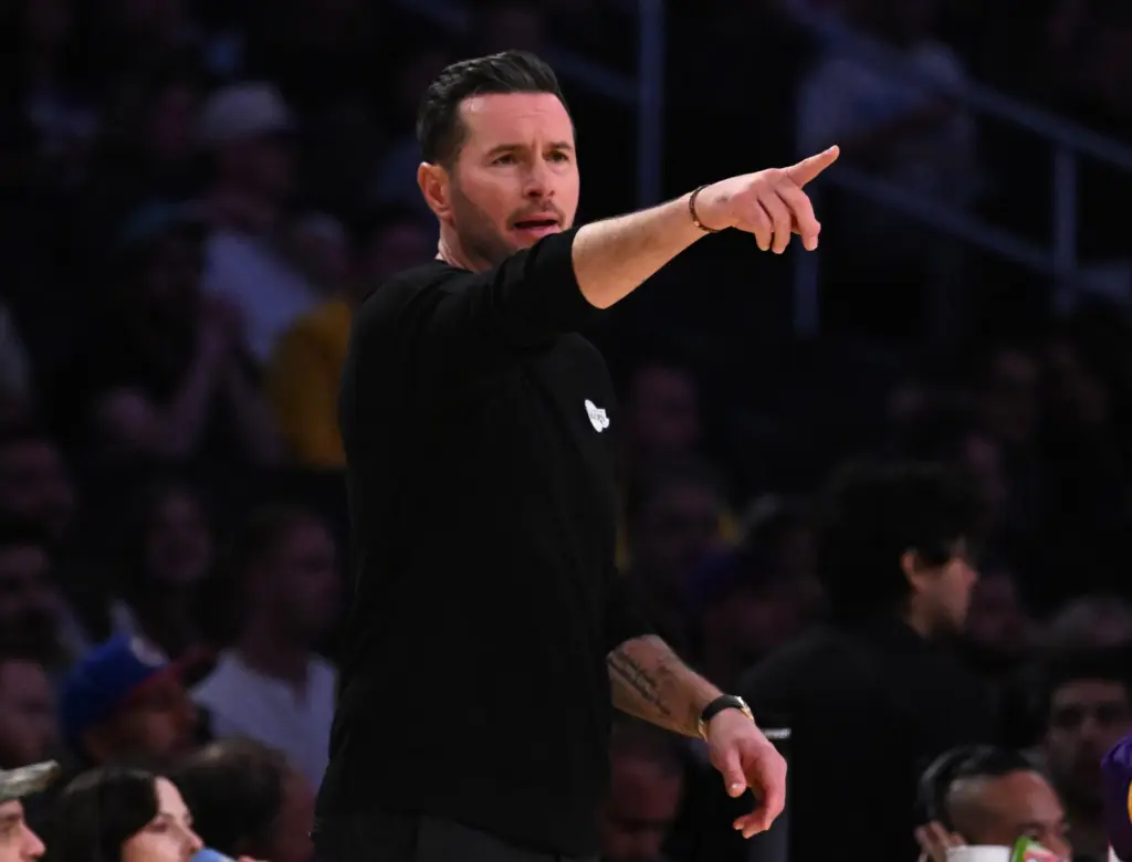 Lakers head coach JJ Redick gestures from the sideline during...
