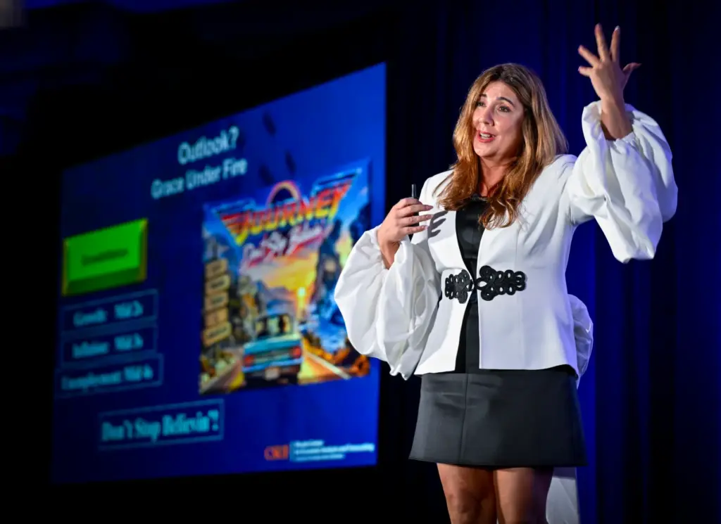 An animated Mira Farka, professor of economics and co-director of...