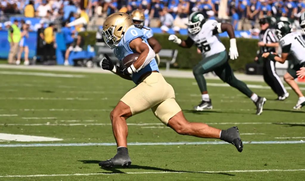 UCLA linebacker Donavyn Pellot (0) intercepts a pass against Michigan...