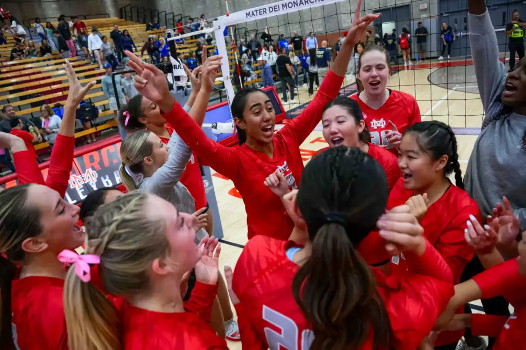 Mater Dei’s Westley Matavao, center, celebrates with her teammates after...