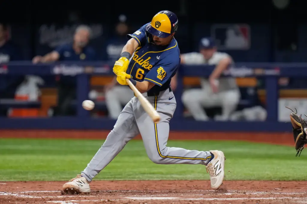 The Milwaukee Brewers’ David Hamilton connects for an RBI single...