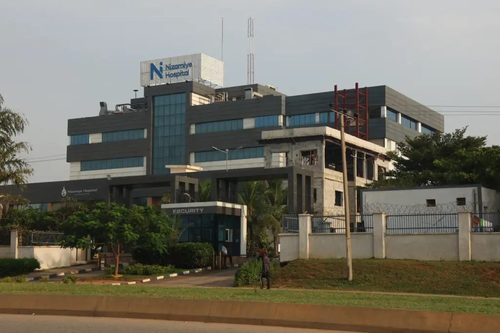 A man walks past a hospital in Abuja, Nigeria, Wednesday,...