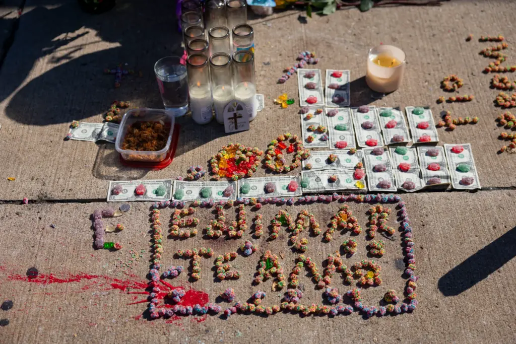 Candy, toys, balloons, dollar bills and other items are left...