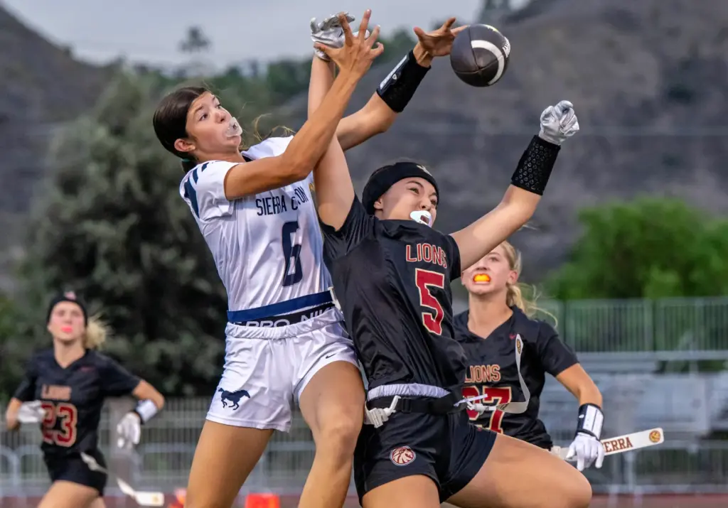 JSerra defender Abby VanderWeerd (5), right, breaks up a pass...