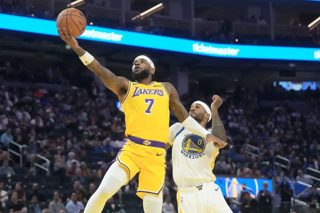 Lakers guard Jaden Hardy shoots in front of Golden State...