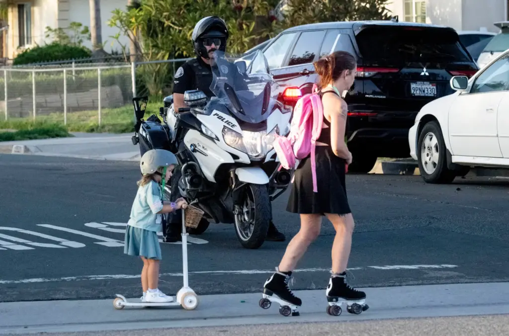 Two people head to Schmitt Elementary School in Westminster during...