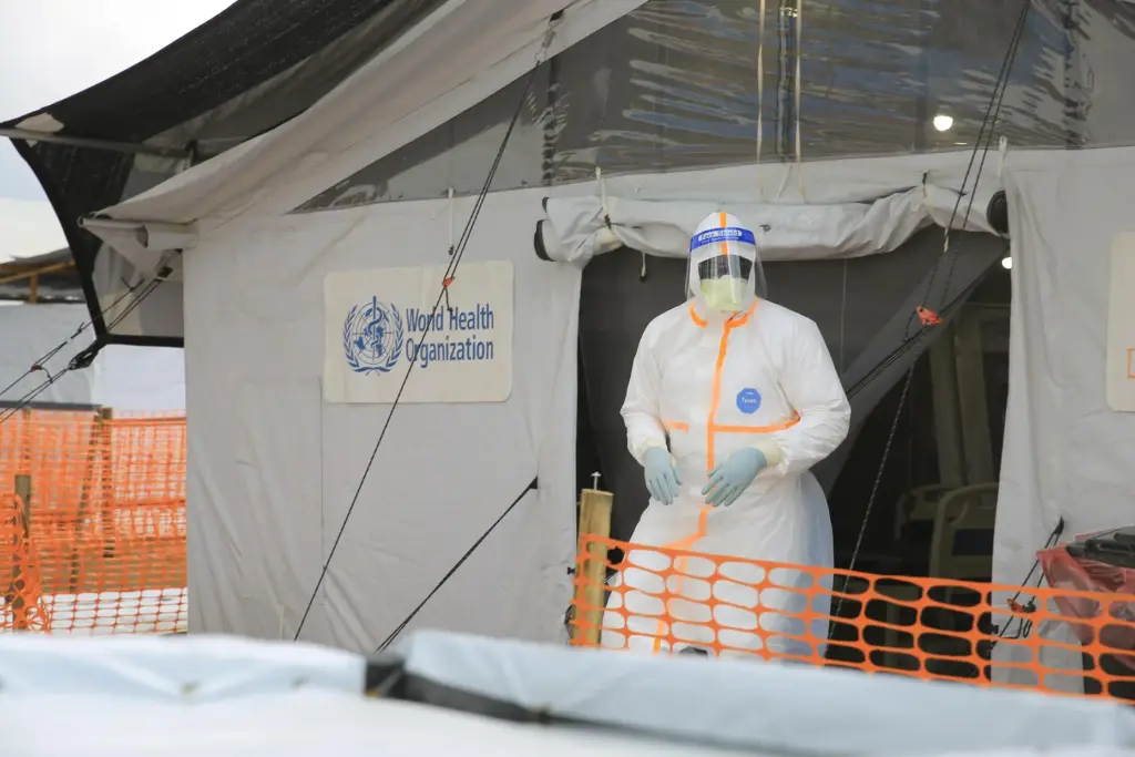 A health worker wears full gear at a Ebola treatment camp in Butembo, Congo.