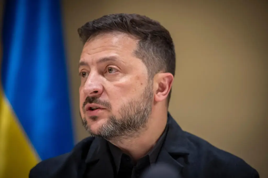 Ukrainian President Volodymyr Zelenskyy speaks to the media after a...