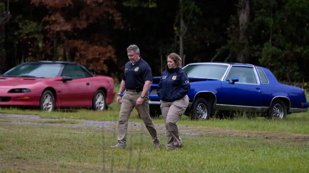 Authorities investigate the scene of a mass shooting in Vienna, Georgia.