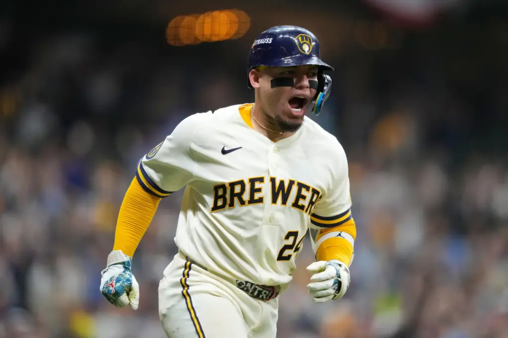 Milwaukee Brewers’ William Contreras reacts after hitting a home run...