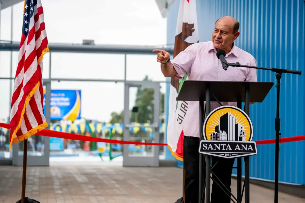 Representative Lou Correa speaks at the ribbon cutting ceremony for...