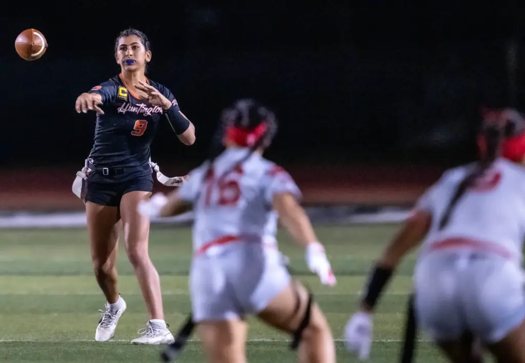 Huntington Beach quarterback Roxie Shaia (9) throws the ball during...