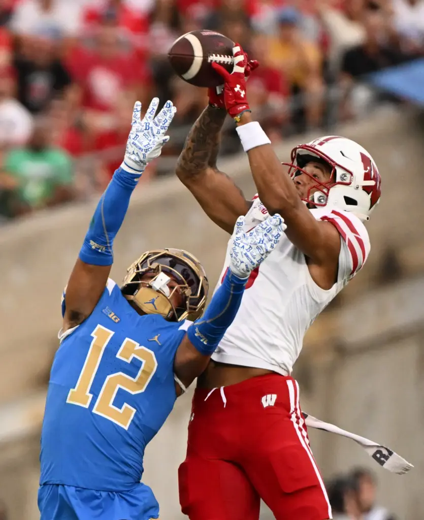 Wide receiver Jaylon Domingeaux #9 of the Wisconsin Badgers catches...