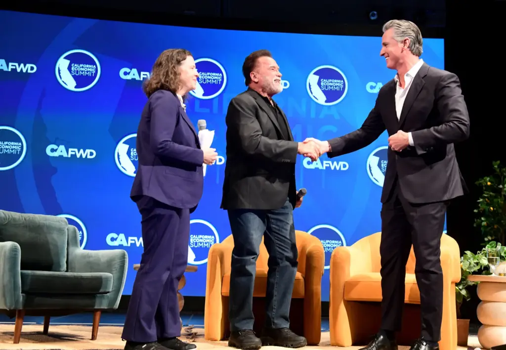 Governor Gavin Newsom participates in a fireside chat with former...