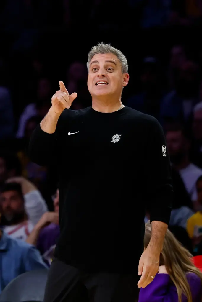 Portland Trail Blazers head coach Micah Nori yells out to...