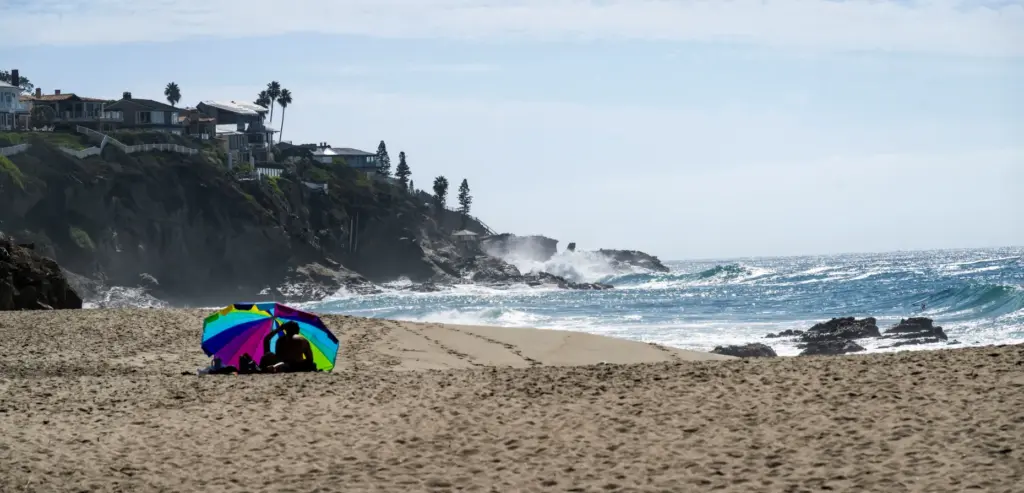 A beachgoer sits at Thousand Steps Beach in Laguna Beach...