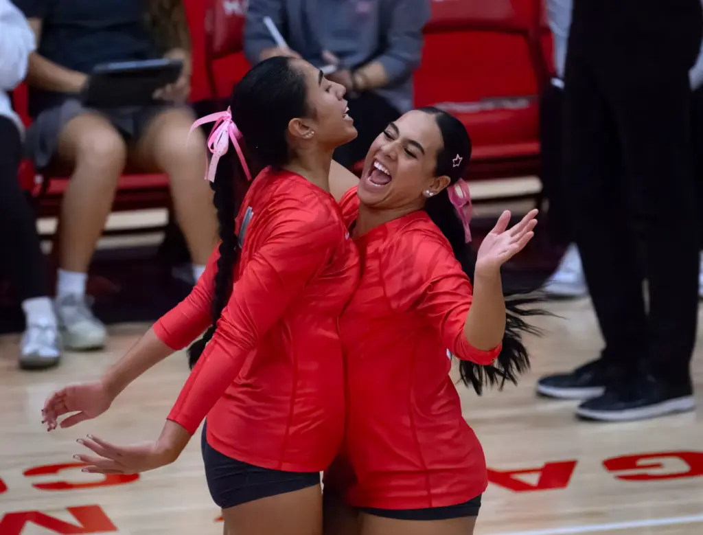 Mater Dei’s Kalea Lee, right, bumps Westley Matavao as they...